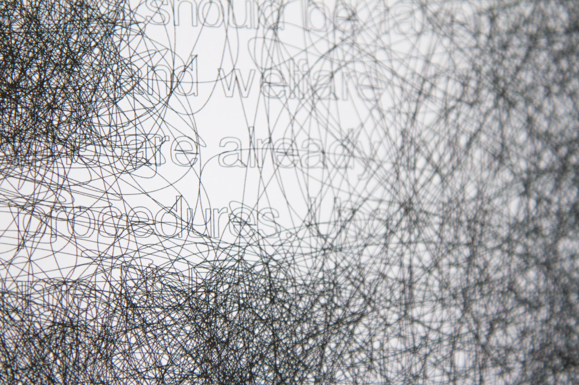 Detail of a poster with deteriorating typography